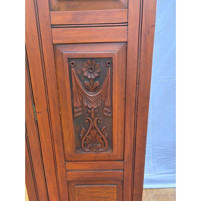 An exceptional late Victorian to Edwardian era (circa 1890–1910) mirrored wardrobe armoire, likely of English or...