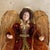Large Angel Topper with Porcelain face and hands. Enhance your holiday décor with the elegance of this angel tree topper....