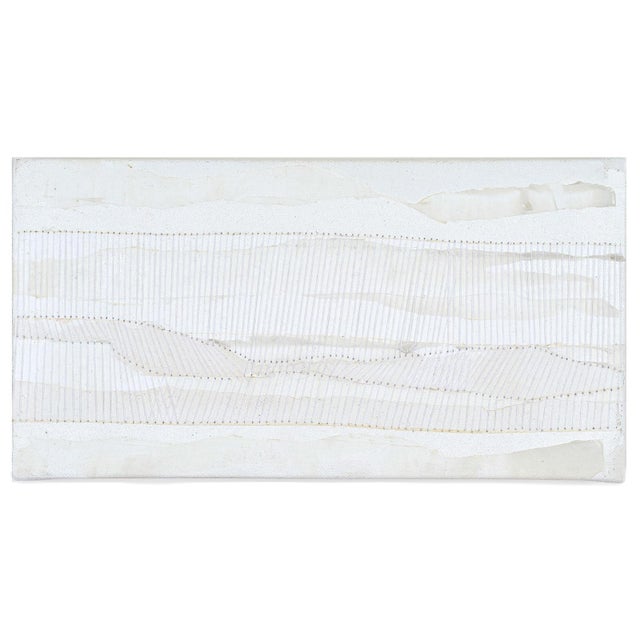 This monochromatic painting layers white acrylic paint with stitched thread, creating a surface that is at once minimal...