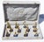 Handmade set of 12 gilt silver and lapis lazuli place card holder. Each a different stringed instrument. In the original...