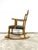 Rocking chair in solid oak. Original upholstery. Designed by Henning Kjærnulf for E.G Møbelfabrik. Denmark 1960s.