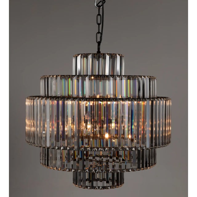 The Axa Chandelier is meticulously crafted with Industrial Steel and adorned with beautiful Crystals, creating a...