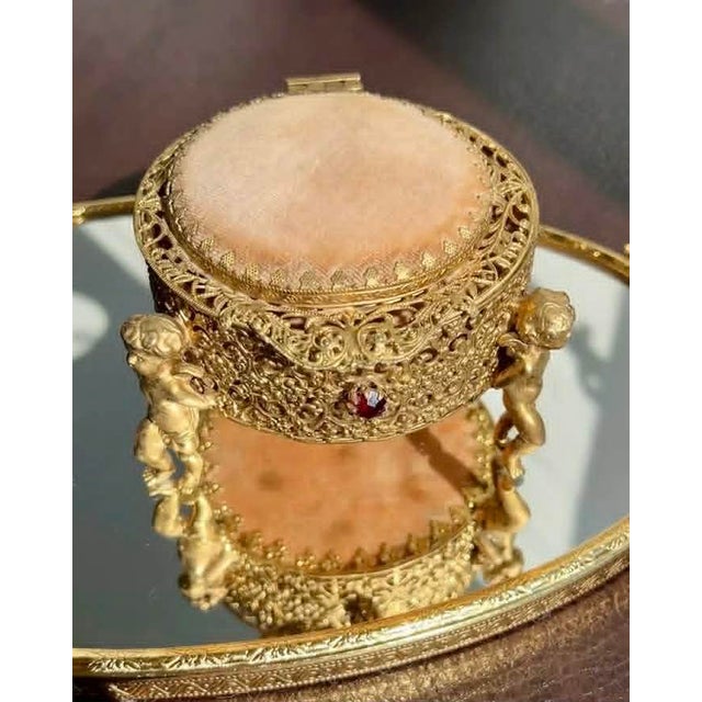 Mid-Century Modern Three Footed Cherub Round StyleBuilt Style Vintage Design Jewelry Casket/ Box With Pink Plush on the Top and Inside & Burgundy Red Stones Decoration For Sale - Image 3 of 11