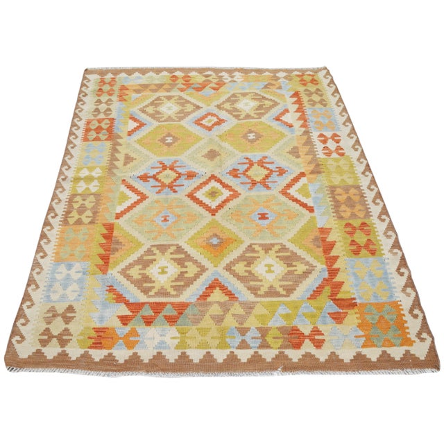 Maimana hand woven wool kilim with natural colors.
