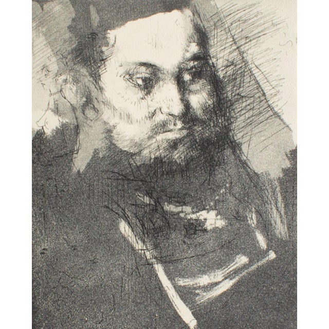 A 1962 portrait etching the American artist Jack Levine (1915-2010). This print features a stylized portrait of a man in...