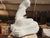 This impressive, large-scale Carrara marble sculpture depicts a classical female nude in a graceful seated pose. Carved...