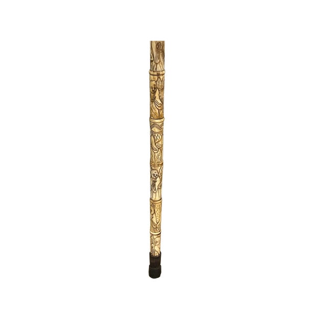 Imagine a walking stick of singular craftsmanship, crafted by hand with intricate detail and care. This walking stick...