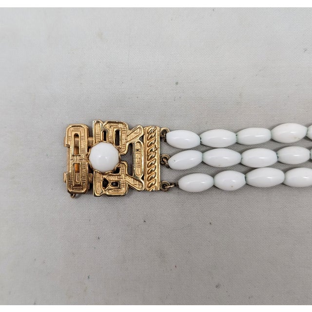 Napier Vintage 1960s Signed Napier Goldtone & White Beaded Asian Influenced Bracelet For Sale - Image 4 of 13