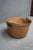 Antique hand-hammered copper apple butter kettle featuring a warm, naturally aged patina and a hand-forged wrought iron...