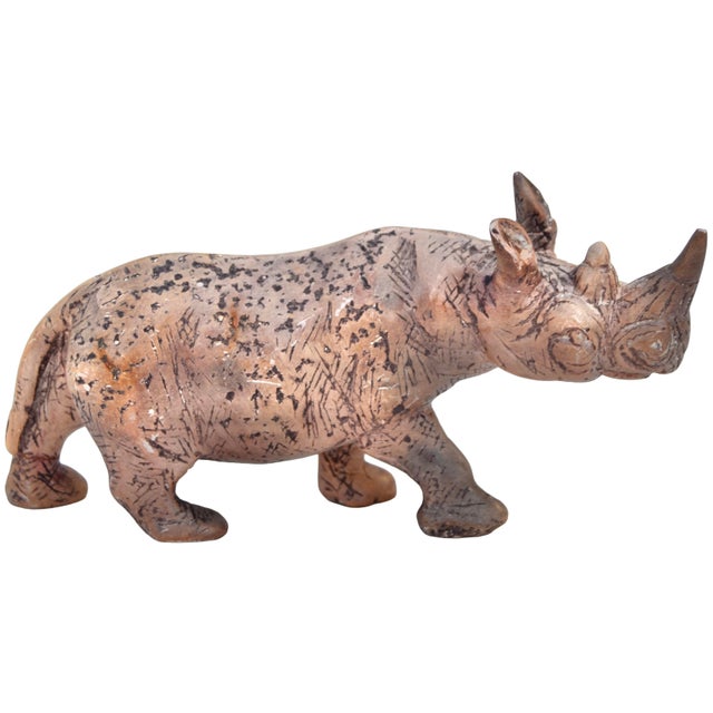 One-of-a-kind gorgeous vintage West-African rhino figurine handmade from natural heavy soapstone with a remarkable...