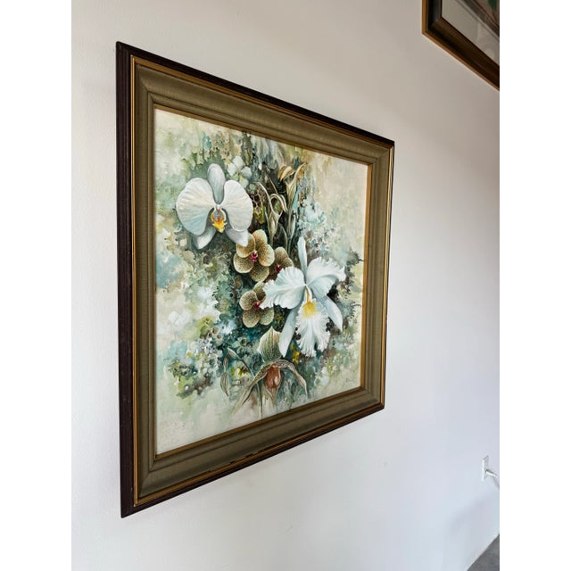 A captivating 1970’s tropical botanical oil painting depicting a lush arrangement of orchids in full bloom. The artist...