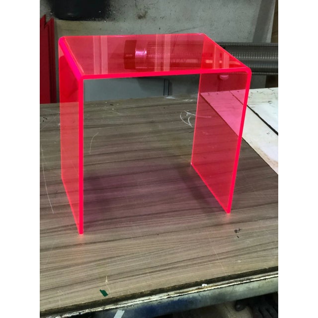 Neon Pink Lucite Waterfall Side Table is made with 3/8" thick acrylic and "waterfall" rounded corners, making it soft yet...