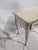 Elegant vintage French Provincial style writing desk featuring a cream painted finish with blue trim, cabriole legs,...
