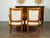 A pair of Italian walnut armchairs from the mid 19th century, with tapered legs and new upholstery. Created in Italy...