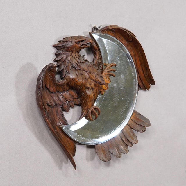 Antique Hand-Carved Wooden Eagle Mirror with Crescent Glass Item e8168 This decorative wall mirror features a finely hand-...