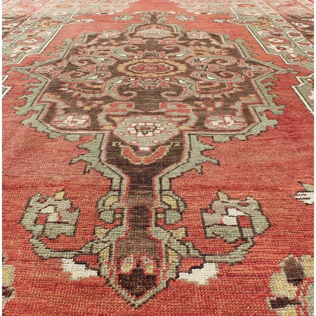 1920s Antique Turkish Oushak Rug With Medallion in Soft Red, Light Green & Brown For Sale - Image 5 of 9