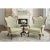 Vintage French Louis XV style carved wood wingback bergère chairs featuring dramatic serpentine backs, exposed carved wood...