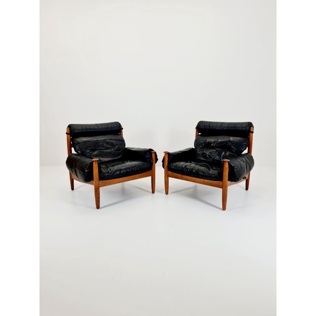 Mid century armchairs By Eric Merthen for ire möbler in leather and Oak wood , Sweden 1960s The beautiful armchair is very...