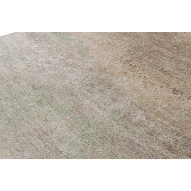 Made with hand-knotted silk, this 8x10 contemporary rug is a rich new addition to Rug & Kilim’s Modern rug collection—with...