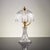 We are offering a high-quality, decorative crystal table lamp from the 1960s. It consists of a clear, cut crystal base and...