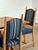 This set of eight dining chairs in style of Henning Kjærnulf. Each chair is constructed in solid oak, with the back...
