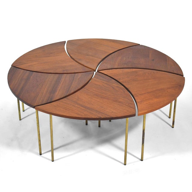 A brilliantly inventive design by Peter Hvidt, the model #523 coffee table by France & Son is comprised of 6 individual...