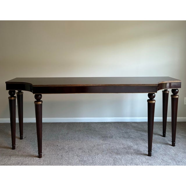 Elegant designer console table by Barbara Barry for Baker Furniture featuring a refined modern Regency silhouette with...