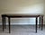 Elegant designer console table by Barbara Barry for Baker Furniture featuring a refined modern Regency silhouette with...