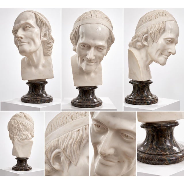 Large vintage neoclassical-style male bust sculpture featuring finely detailed facial features and hair, mounted on a...
