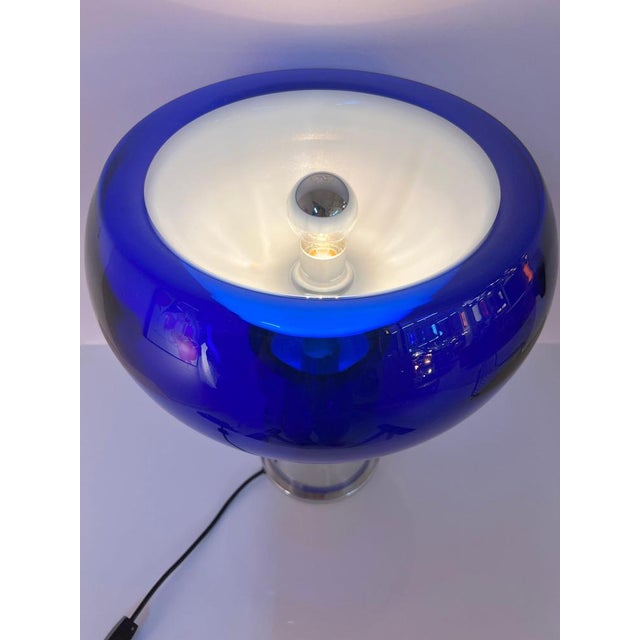 This spectacular table lamp from the 1970s is an absolute rarity and an exquisite collector's item from the traditional...