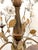 This exquisite wooden tole chandelier features five scrolling arms, each accented with porcelain roses that add a touch of...