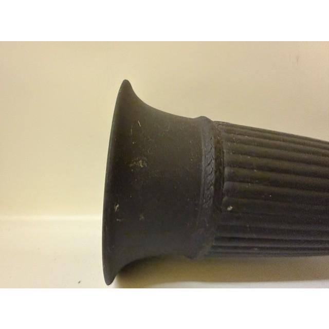 An elegant mid-century production of a classic Greek-revival form, this vintage Wedgwood footed trumpet vase features an...