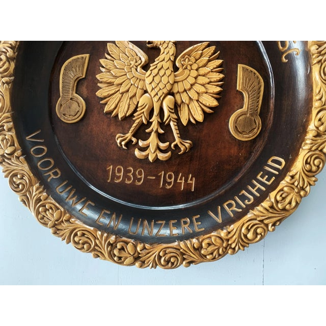 A hand-carved commemorative plate of great sentimental, historical, and artistic value. "for your freedom and ours" –...