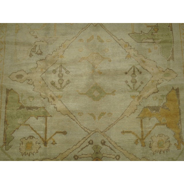 One-of-a-kind Turkish Oushak with a garrus design that was copied from early 20th century antique Persian Bidjar rugs....