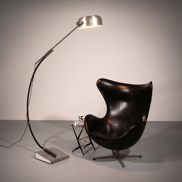 Bring timeless character and sculptural elegance into your home with this authentic 1970s chrome arc floor lamp — a...