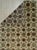 Talia Artistic Green Hand Knotted Wool Rug, Country of Origin: China. This contemporary hand-knotted piece offers a...