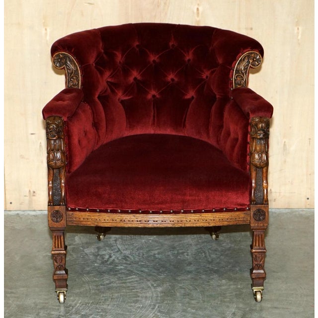 This is a lovely original Regency circa 1810-1820 carved oak frame depicting Lions heads armchair This chair is an...