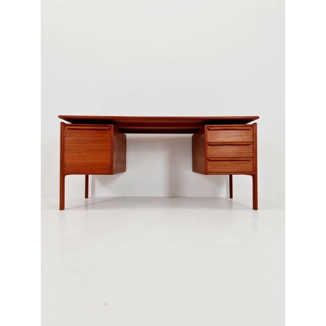 Danish teak freestanding desk by c.v., denmark, 1960s. Dimensions: 75 d x 150 w x 71 h cm. Chair space: w 69 cm d 69 cm....