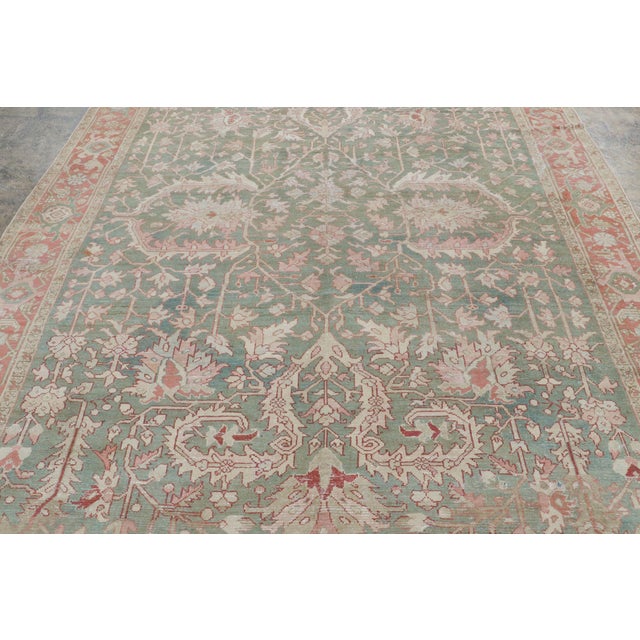 This 8x11 antique Persian Karja rug, hand-knotted in wool and originating circa 1900-1920, is a remarkable example of...