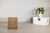 This vintage storage basket is constructed with a solid wood interior frame fully clad in tightly hand-woven rattan. The...