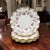 A graceful expression of English artistry, this Royal Crown Derby plate captures floral luxury with restrained precision....