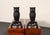 Pair of andirons (circa 1920s/30s, USA) composed of cast iron owls on arched branch uprights fitted to billet bars. The...
