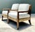 This sophisticated pair of “Fishers Island” lounge chairs by EJ Victor exemplifies the intersection of traditional British...