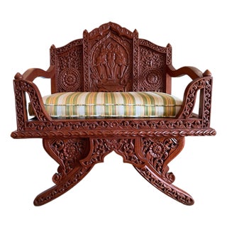 Vintage Thai Hand-Carved Teak Elephant Motif Settee / Currule Chair For Sale