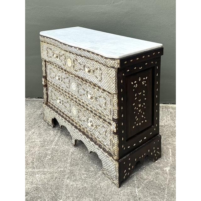 This stunning vintage chest of drawers is a breathtaking display of Middle Eastern artistry, drawing deep influence from...