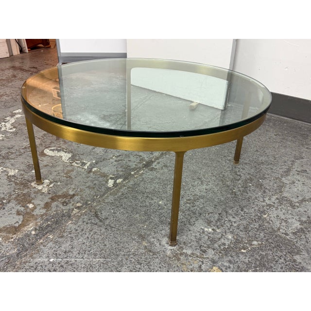 Design Plus Gallery presents a Polished Brass Coffee Table from the 1970s' by Nicos Zographos. This coffee table in solid...