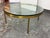 Design Plus Gallery presents a Polished Brass Coffee Table from the 1970s' by Nicos Zographos. This coffee table in solid...