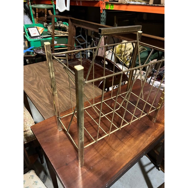 Up for consideration is a beautiful brass metal minimalist magazine rack. This would look lovely on display in your home...