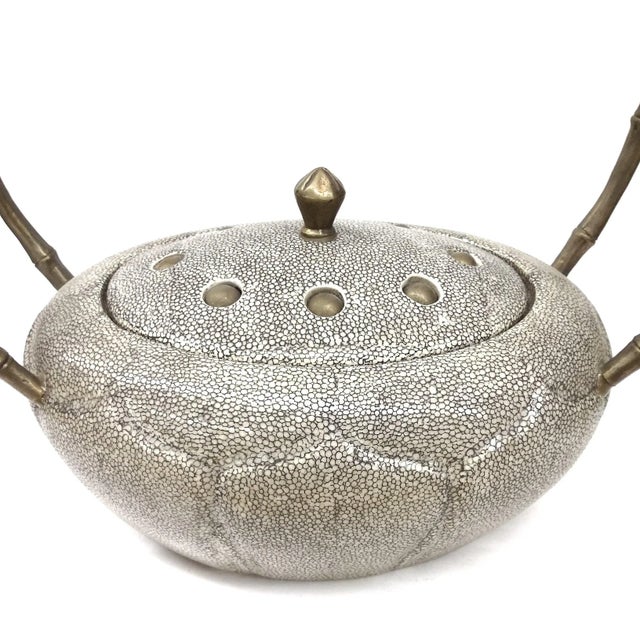 This ultra cool covered dish or bowl has long wrapped brass bamboo handles. The painted design is similar to eel skin,...