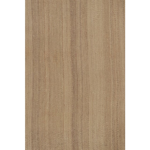 This 5x8 Rez Kilim explores the beauty of restraint through layered beige tones and delicate linear movement. Handwoven in...